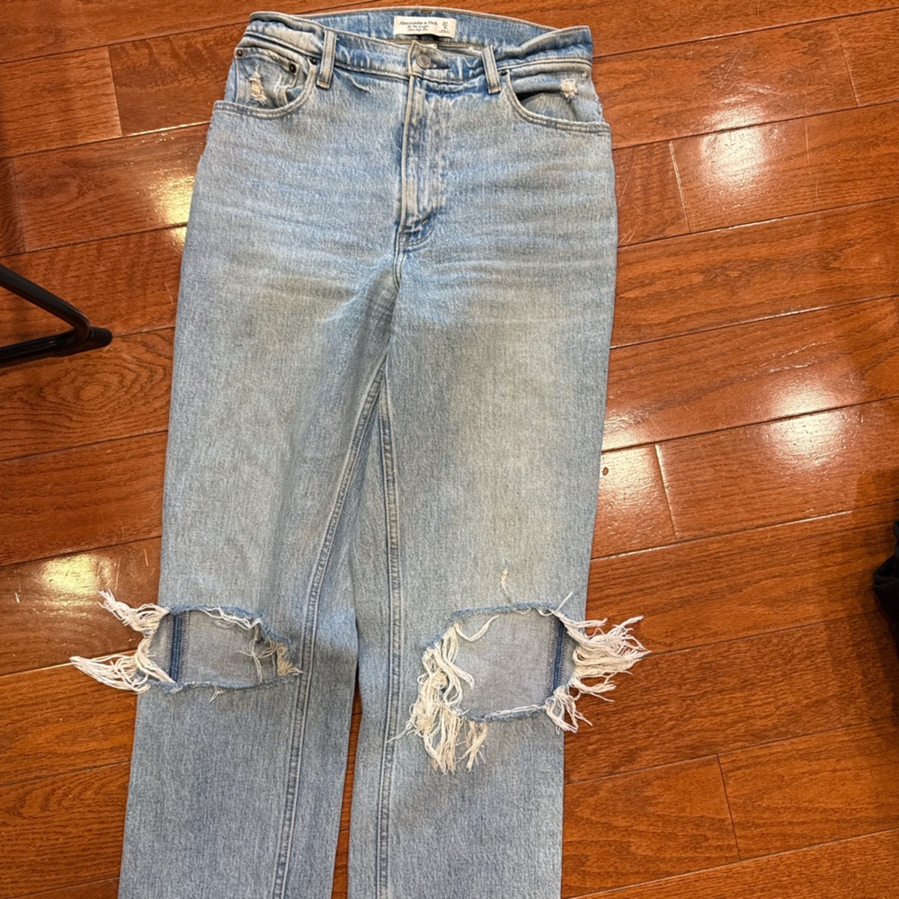 Women's Light Blue Distressed Jeans